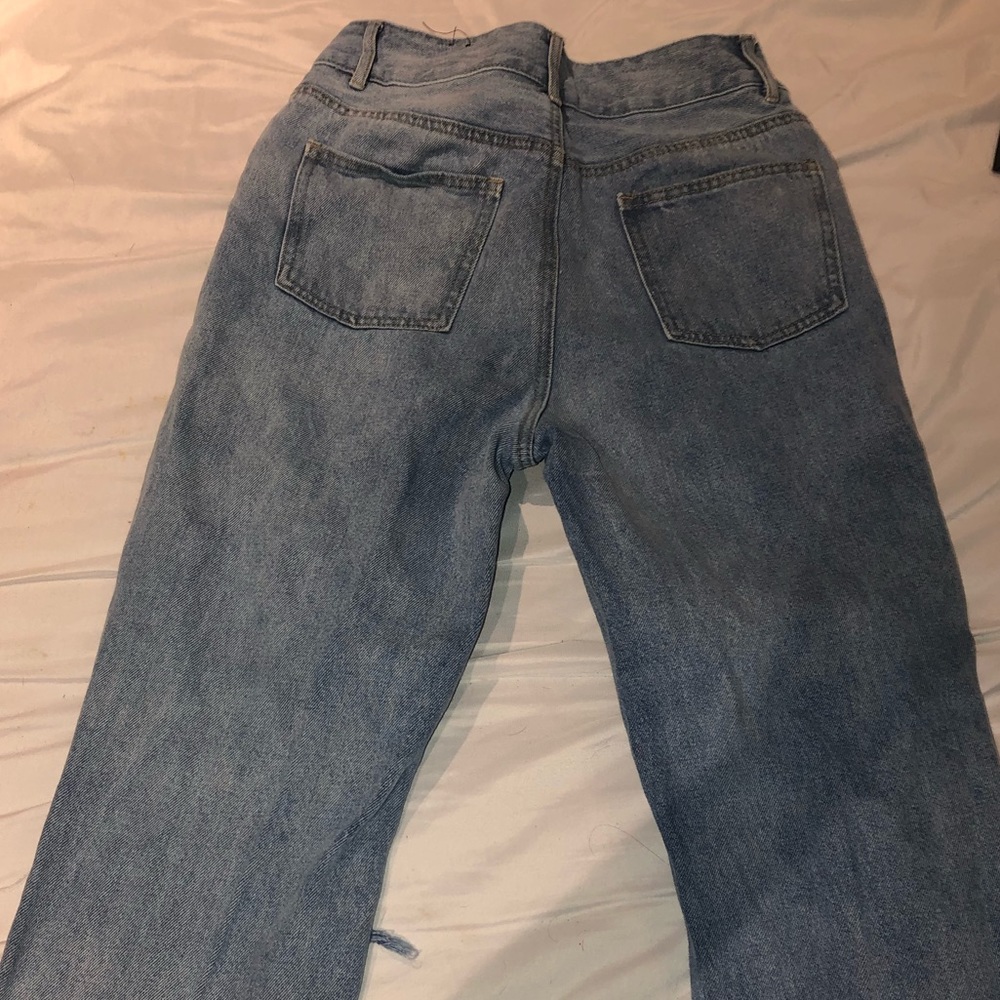 Slouch fit/straight leg distressed jeans